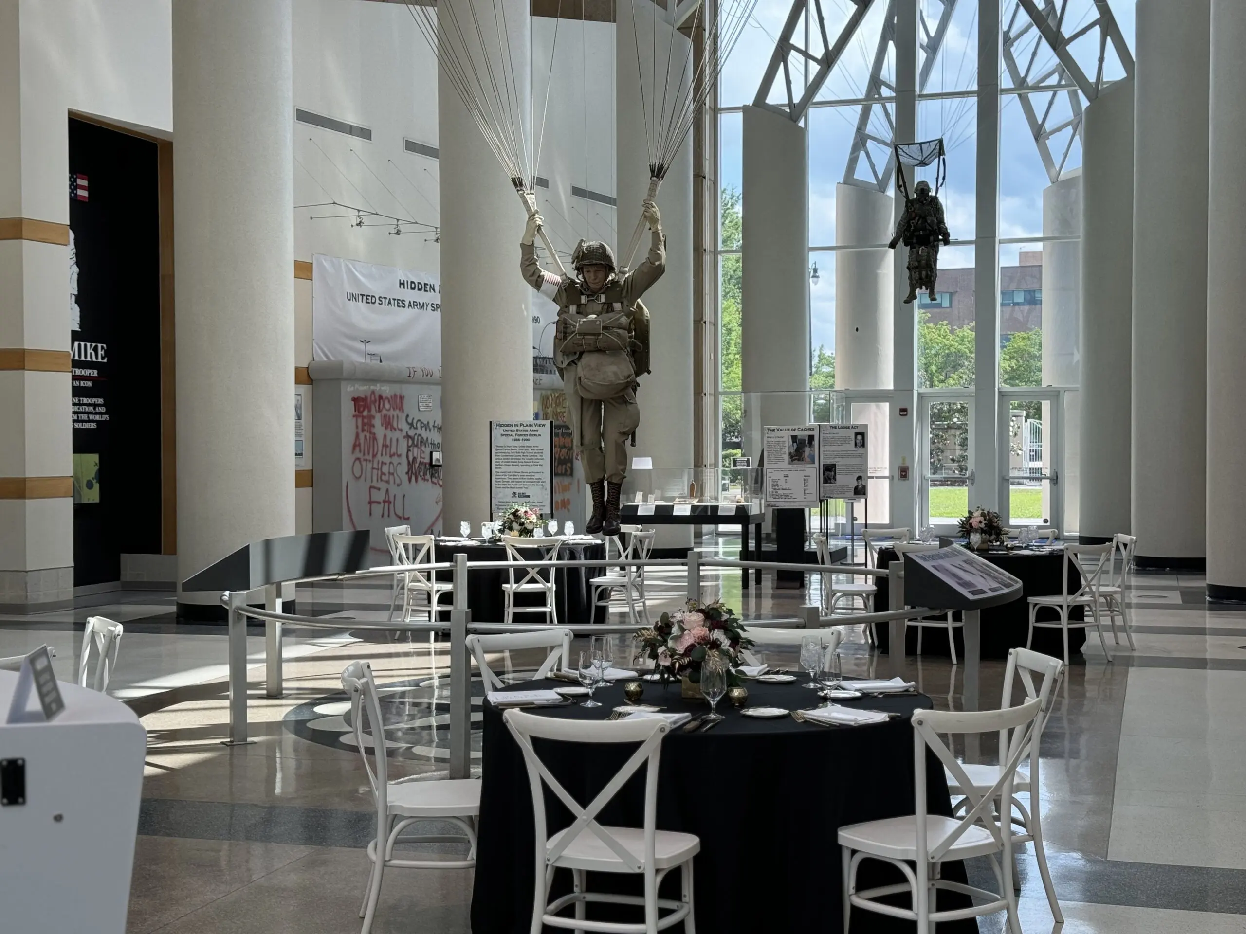 Reception tables arranged inside the museum lobby