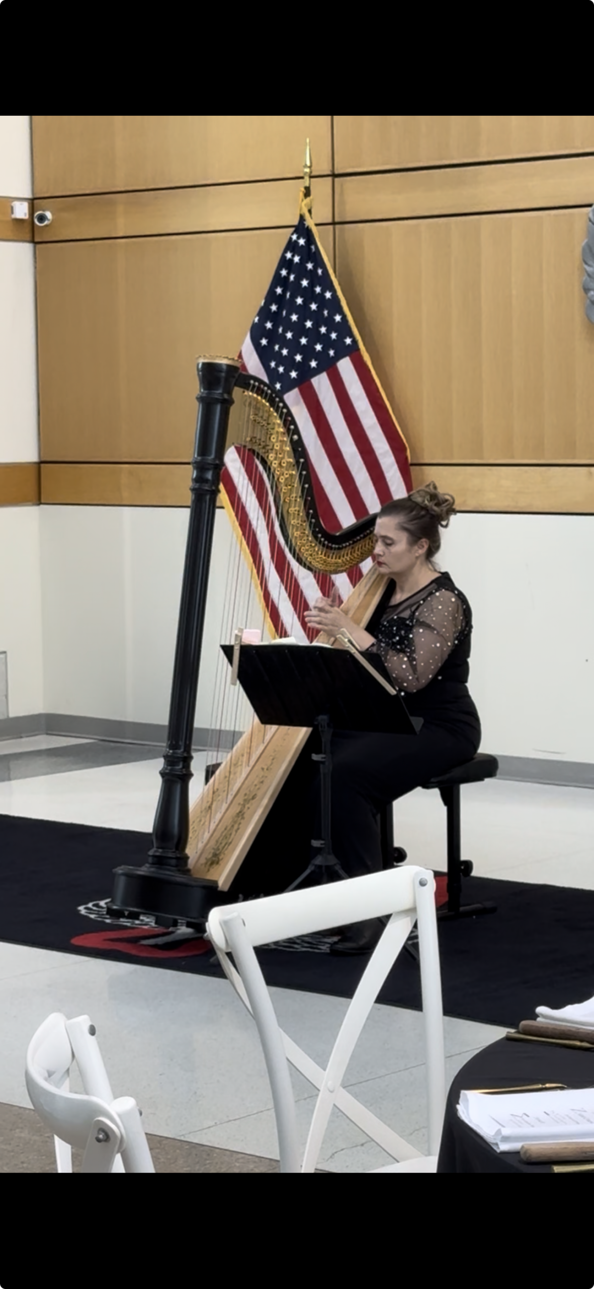 A speaker addressing guests during an event at the Museum