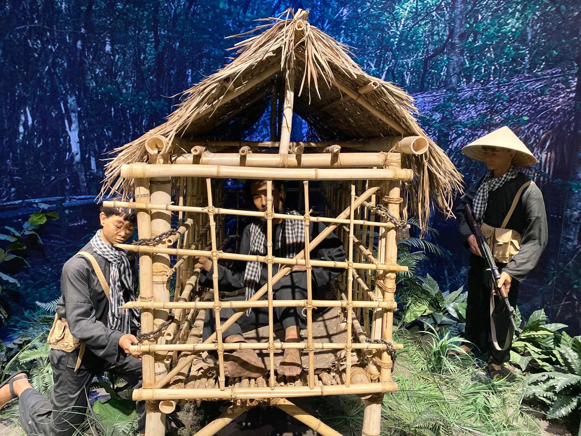 Museum gallery display recreating James Nick Rowe's imprisonment during the Vietnam War