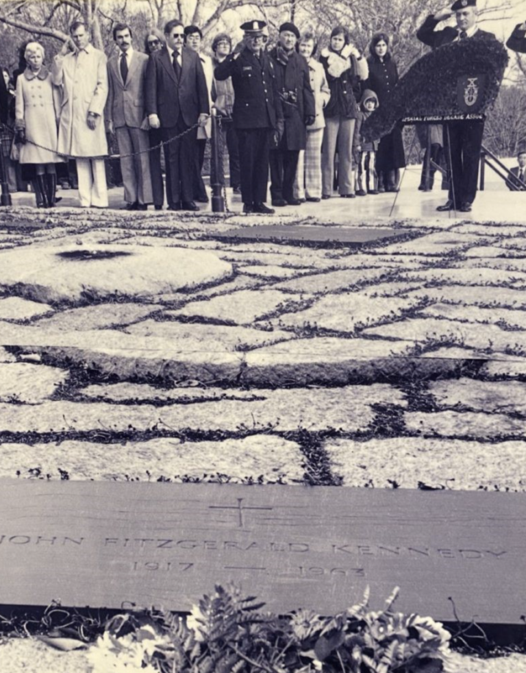 Green Berets pay homage to the slain President Kennedy at his gravesite at Arlington National Cemetery. 