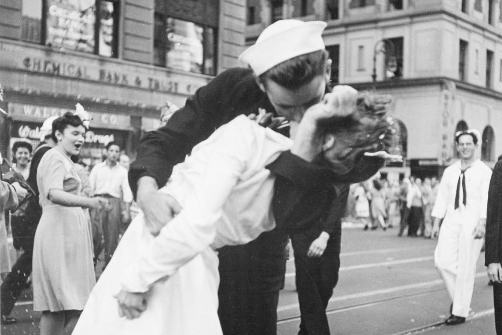 A photograph taken by Alfred Eisenstaedt which shows a U.S. Navy sailor grabbing and kissing a nurse on Victory over Japan Day in New York City’s Times Square