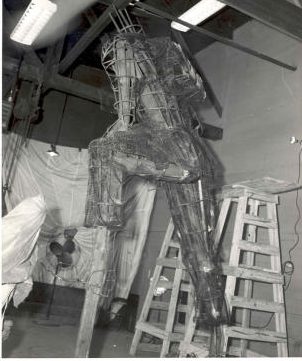 The bare steel beam and wire mesh frame of the statue, ready for its fiberglass skin